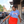 Woman standing outside wearing sunglasses and a Bullzerk Patriotic Dallas tshirt. 