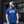 Photo of a man wearing the Bullzerk Cowboys Hell Yeah tshirt, sunglasses and a hat and looking off to the side. 