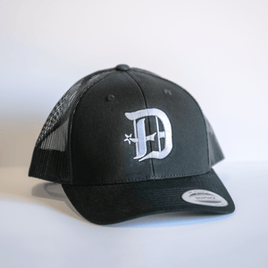 Embroidered D Spur Hat - Black featuring a stylish design, perfect for those looking for a Texas themed gift or a unique Dallas souvenir. This Texas made gift blends fashion and local pride, ideal for anyone who loves Texan gifts or stylish souvenirs from Texas.