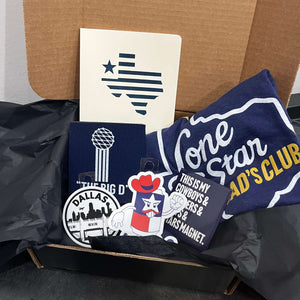 Father's Day Gift Box featuring a Bullzerk Lone Star Dad's Club t-shirt and an assortment of Dallas and Texas-themed small products. 