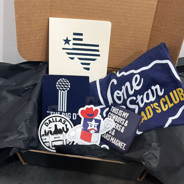 Father's Day Gift Box featuring a Bullzerk Lone Star Dad's Club t-shirt and an assortment of Dallas and Texas-themed small products. 