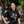 Woman standing outside and laughing, wearing a Bullzerk Icons of Dallas tshirt.