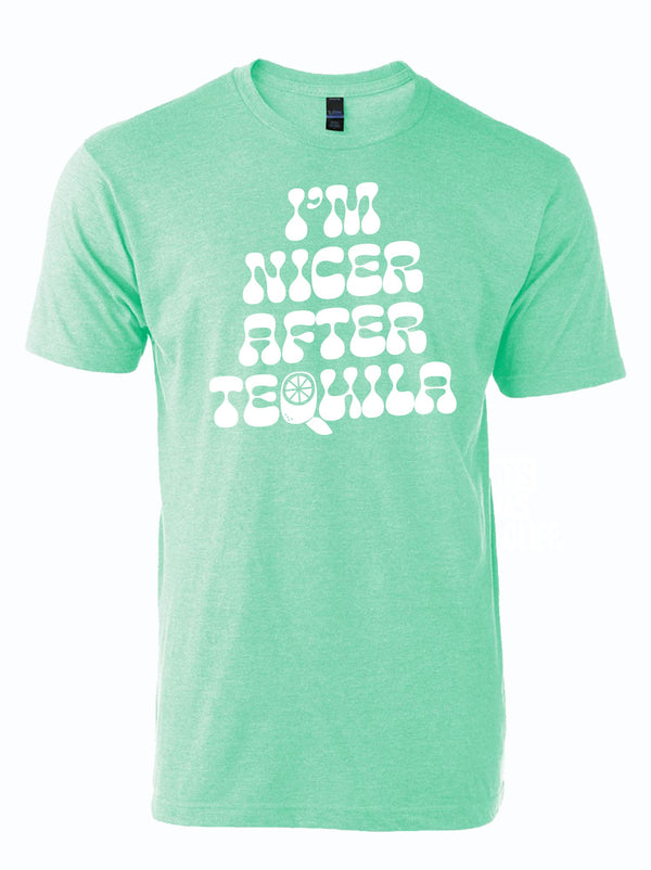 Teal unisex t-shirt featuring the phrase 'I'm Nicer After Tequila' in playful lettering. A perfect Texas themed gift that embodies the fun spirit of Texas culture, ideal as a Dallas souvenir or Texan gift, and proudly Texas made.