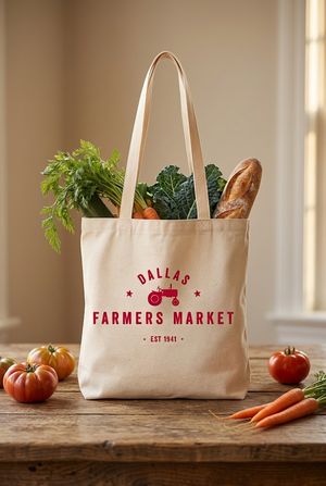 Dallas Farmers Market tote bag styled with fresh produce on a rustic table
