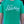 Person wearing a green tshirt with graphic of text reading 