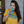 Woman wearing a Bullzerk May Contain Ranch Water tshirt, drinking from a can of ranch water. 