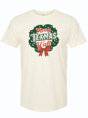 cream t-shirt with 'Merry Texmas Y'all' graphic design on a white background