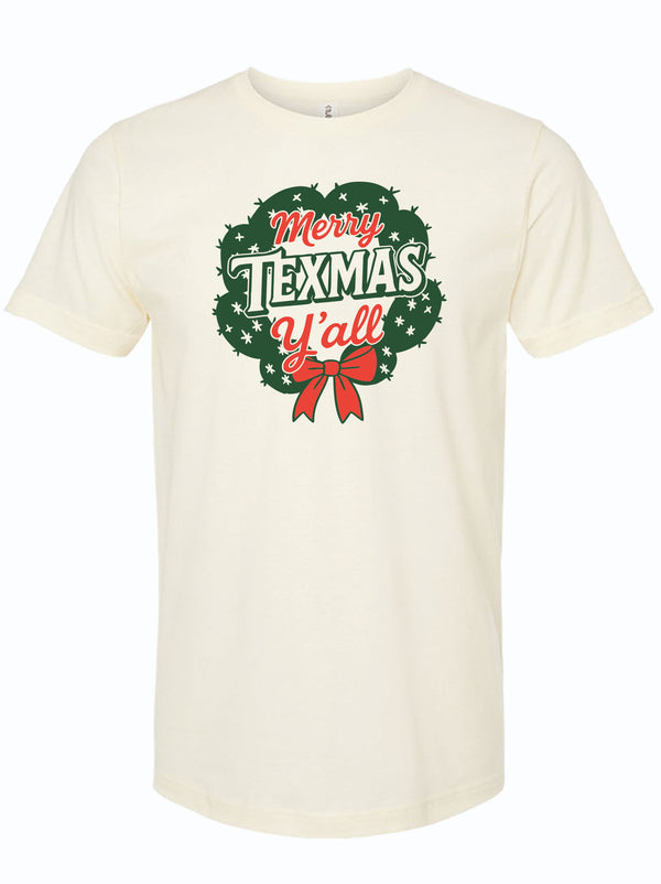 cream t-shirt with 'Merry Texmas Y'all' graphic design on a white background