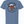 Back view of a slate blue tshirt featuring a graphic design of a Texas-shaped character wearing sunglasses and a cowboy hat playing pickleball. The character is surrounded by a circle of text reading 