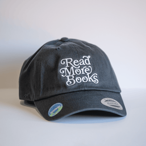 Embroidered Read More Books Hat - Navy, featuring a stylish design, perfect as a Texas themed gift. This 100% cotton hat is an ideal Dallas souvenir and a great addition to any Texan gifts collection.