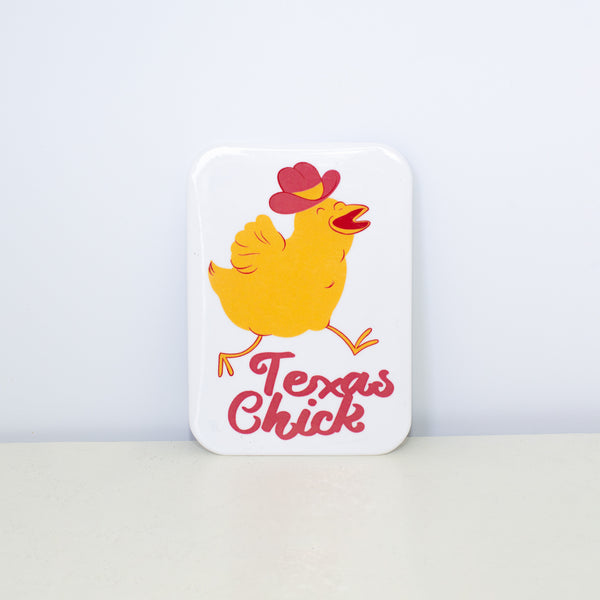 Rectangular , white magnet with Texas Chick design.