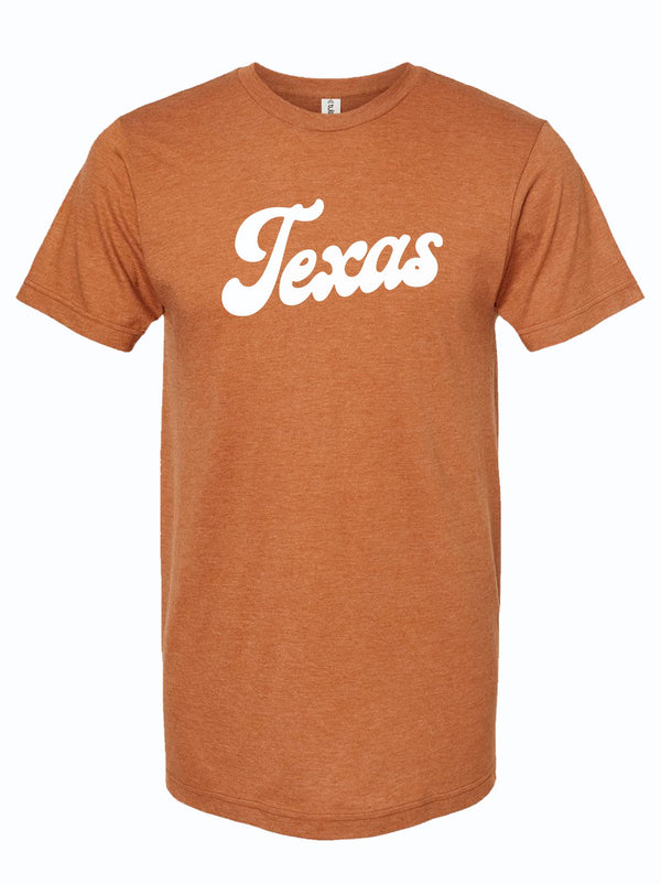 Texas Script Orange t-shirt featuring a bold 'Texas' design in white, perfect as a Texas themed gift. This stylish tee represents Texas Made Gifts, ideal for souvenirs from Texas and the perfect Dallas souvenir to show your Texan pride with unique Texan gifts.