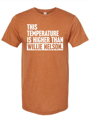 This Temperature Is Higher Than Willie tee featuring a bold white print on a rust-colored shirt, perfect as a Texas themed gift, ideal for those who love Texas Made Gifts, great as souvenirs from Texas, and a fun dallas souvenir or texan gifts.