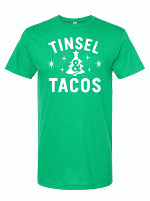 Green t-shirt with 'Tinsel Tacos' text and graphic on a white background