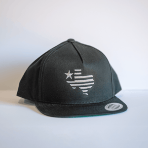 Embroidered Texas Silhouette Flatbill Hat in black, featuring a stylish design perfect for Texas themed gifts. Ideal for anyone looking for Texas made gifts or souvenirs from Texas, this hat is a great Dallas souvenir and perfect for Texan gifts.