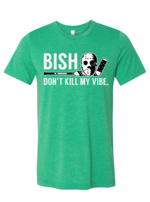 Green shirt that says Bish don't kill my vibe with a hockey stick and hockey mask in Dallas Texas