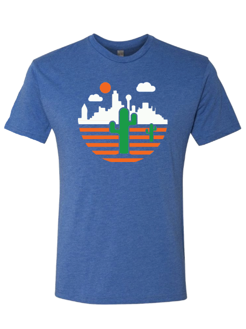 Royal blue tshirt with graphic design of a cactus in front of the Dallas Skyline. 