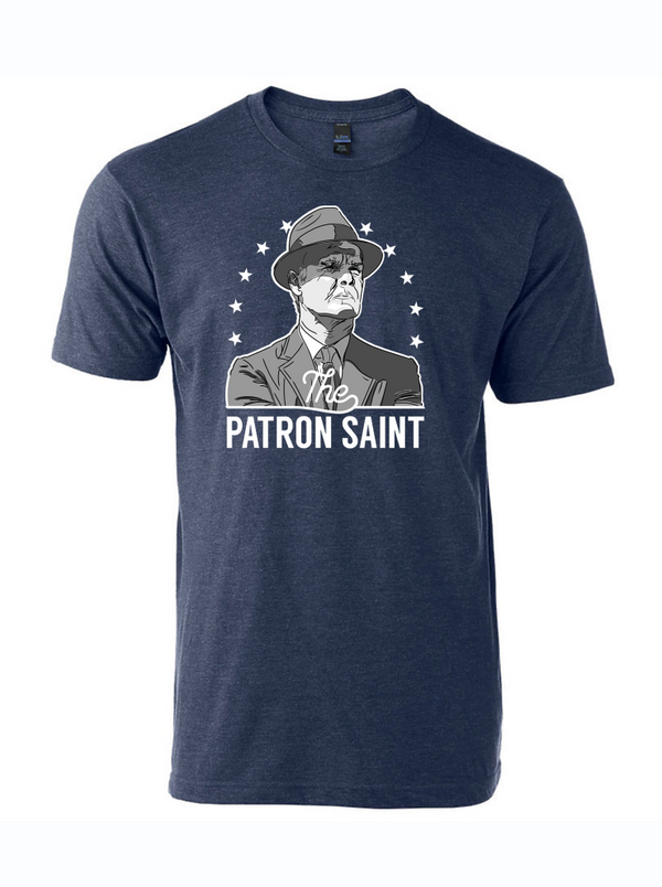 The Patron Saint graphic t-shirt featuring a stylish design, perfect as a Texas themed gift. Made from 50% ring-spun cotton and 50% polyester, this shirt is a great addition to any Texan's wardrobe. Ideal for those looking for Texas Made Gifts, unique souvenirs from Texas, or a memorable Dallas souvenir. Perfectly represents Texan gifts with its eye-catching design!
