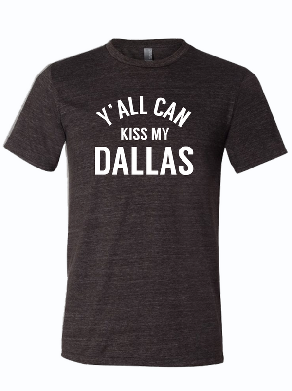 Y'all Can Kiss My Dallas T-shirt displayed on a dark background, perfect for a Texas themed gift, this unisex tri-blend shirt embodies the spirit of Texas. A great choice as a Dallas souvenir, it makes a fun and trendy addition to any Texan gifts collection.